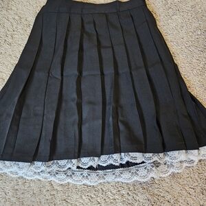 Elegant Black Pleated Skirt with Lace Trim